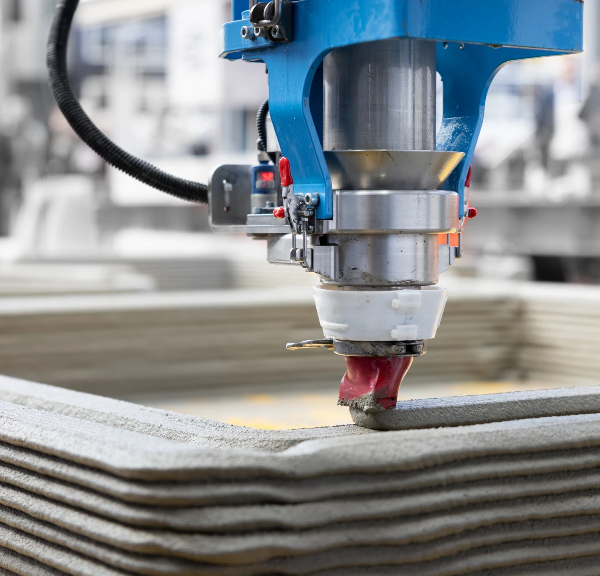 Industrial 3D printing machine in action